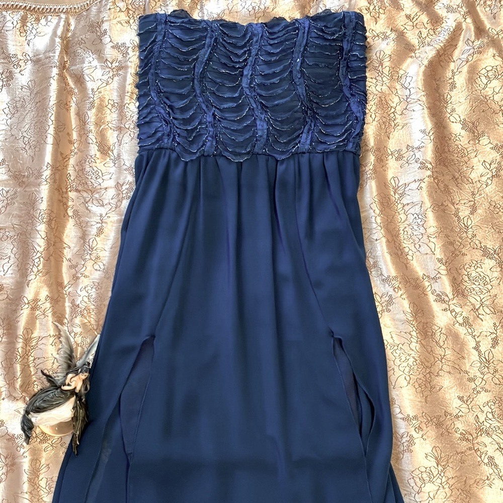 Strapless short in the front and long tale in the back cocktail dress